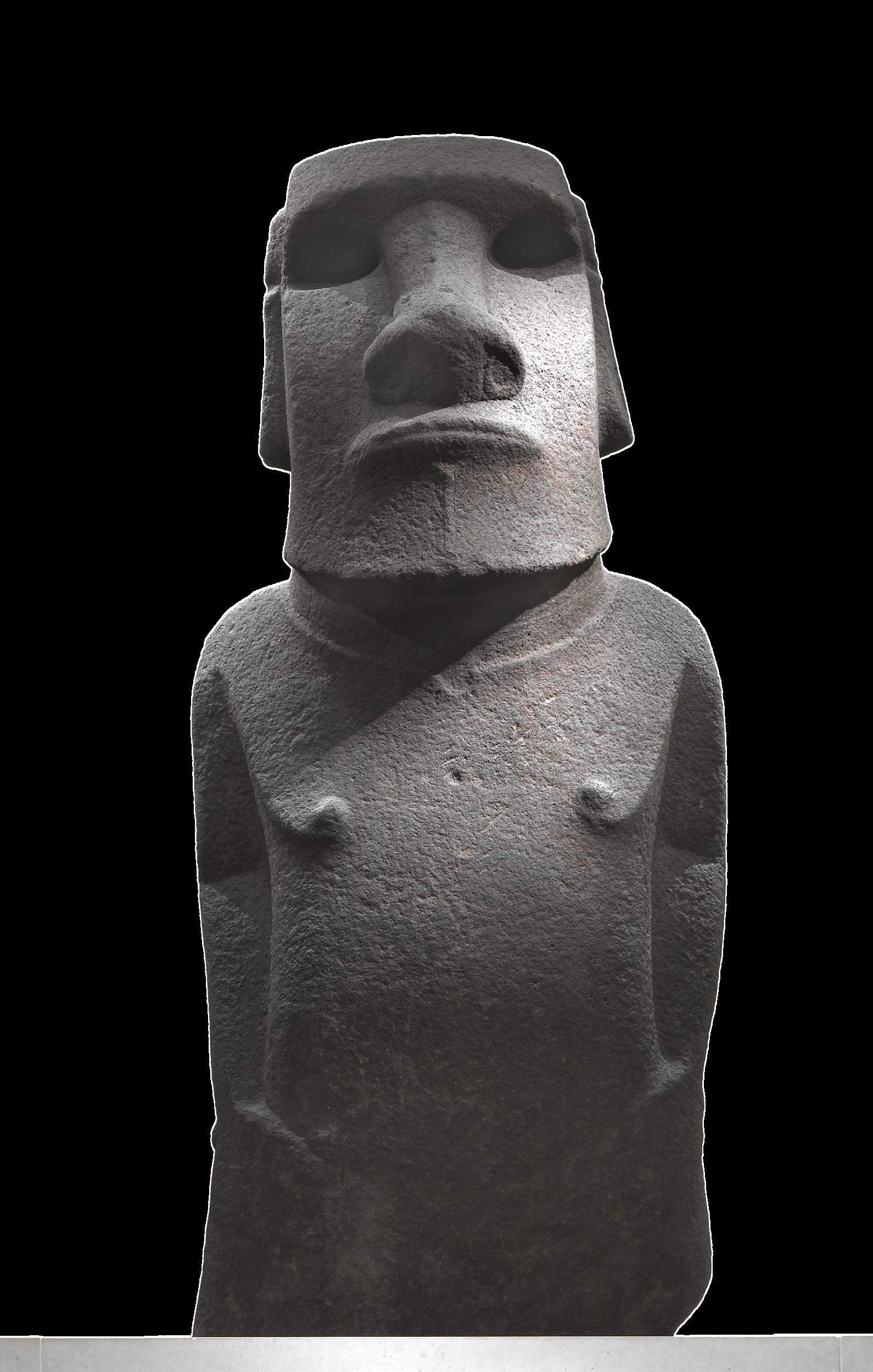 A moai in the shape of a human figure with a smaller head, large nose and lips, rectangular ears, and a torso against a black background. 