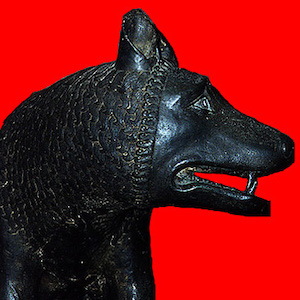 Carving of a black wolf's head