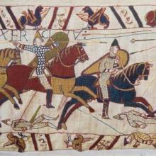 A detail of the Bayeux Tapestry, depicting two horsemen in battle