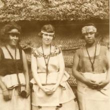 Margaret Mead standing between two Samoan girls image thumbnail