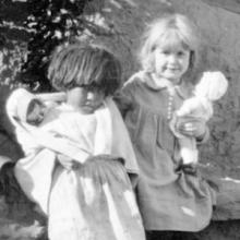 American Indian Girls Playing with Dolls image thumbnail